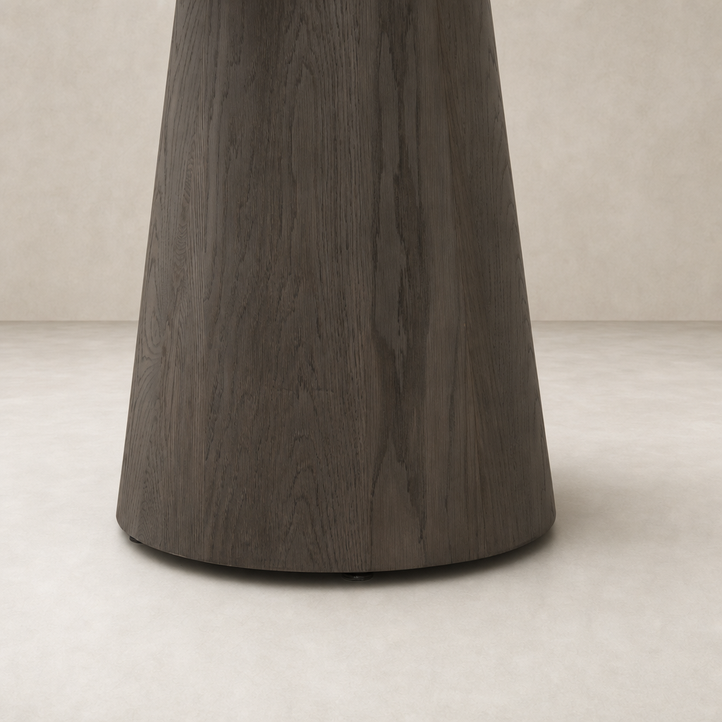 Romina Round Dining Table featuring a sleek white marble finish and elegant design.