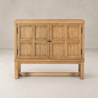 Samara Small Cabinet in Worn Oak featuring a textured paneled design and sturdy base.