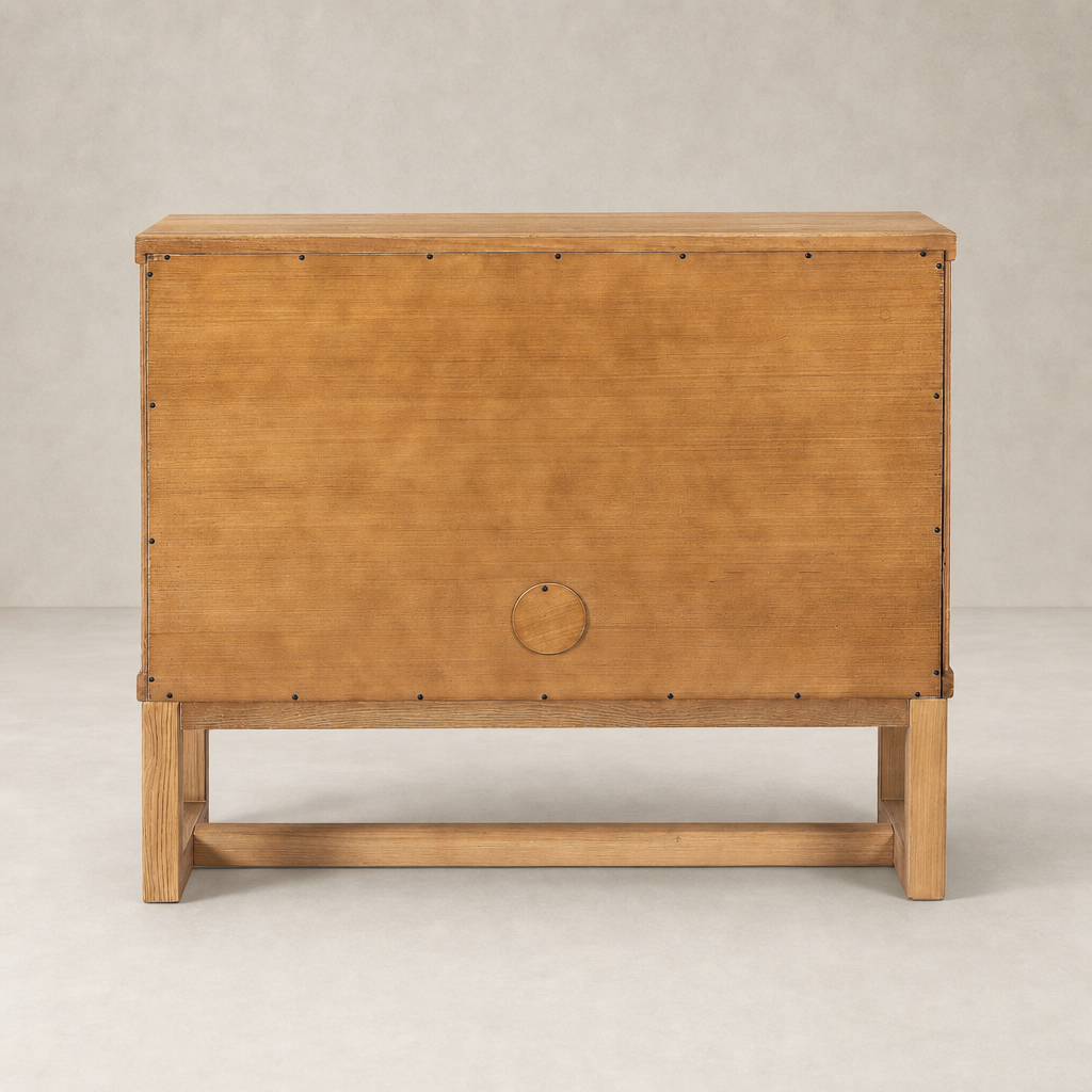 Samara Small Cabinet in worn oak featuring a minimalist design and sturdy legs.