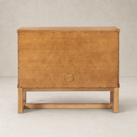 Samara Small Cabinet in worn oak featuring a minimalist design and sturdy legs.