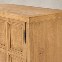 Worn Oak Samara Small Cabinet with textured wood finish and detailed paneling.
