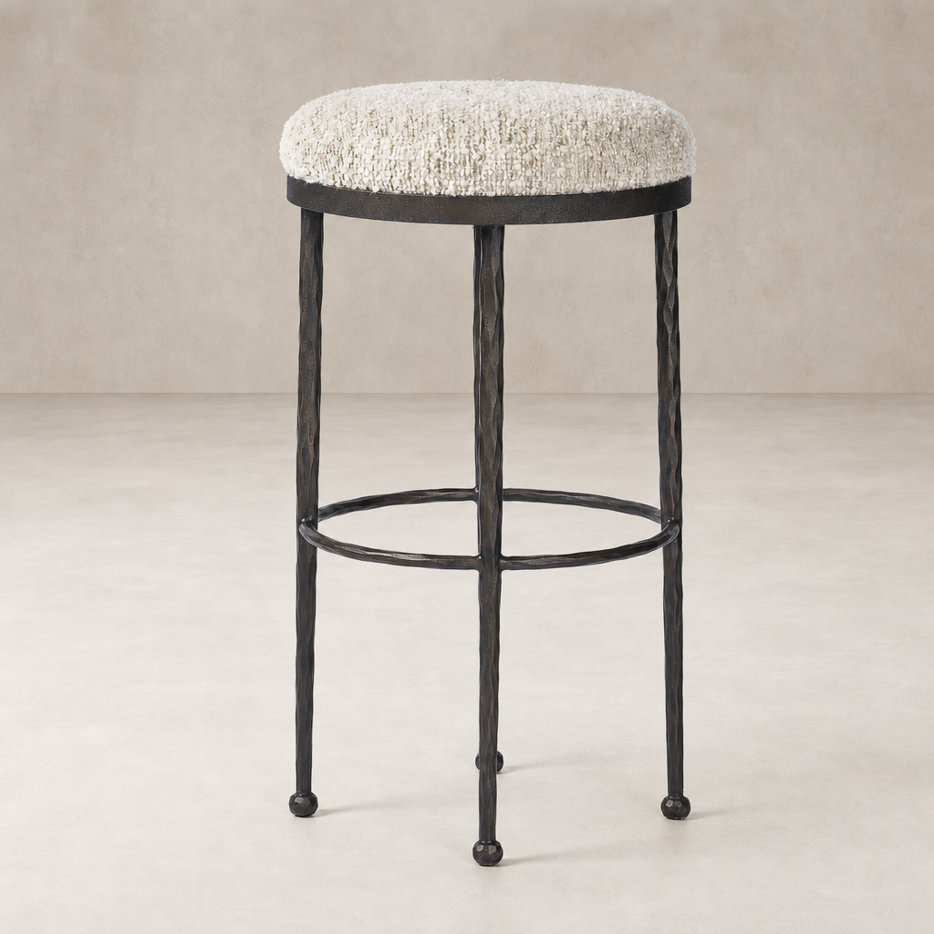 Jasper Bar + Counter Stool in Ivan Stone with textured plush seat and sturdy black base.