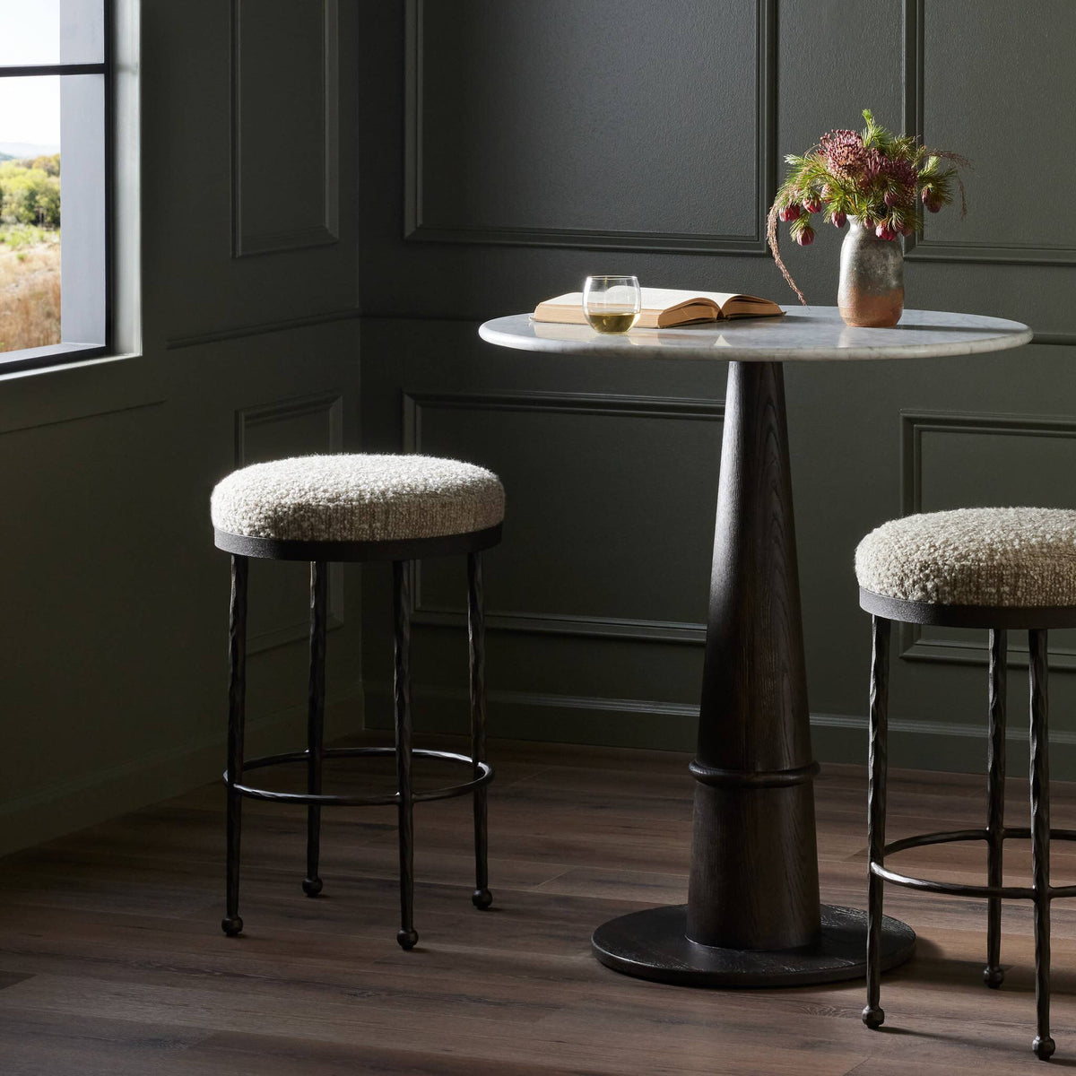 Jasper Bar + Counter Stool in Ivan Stone features a textured fabric seat and sturdy metal legs.