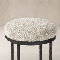 Jasper Bar + Counter Stool in Ivan Stone with soft, textured upholstery and durable metal legs.