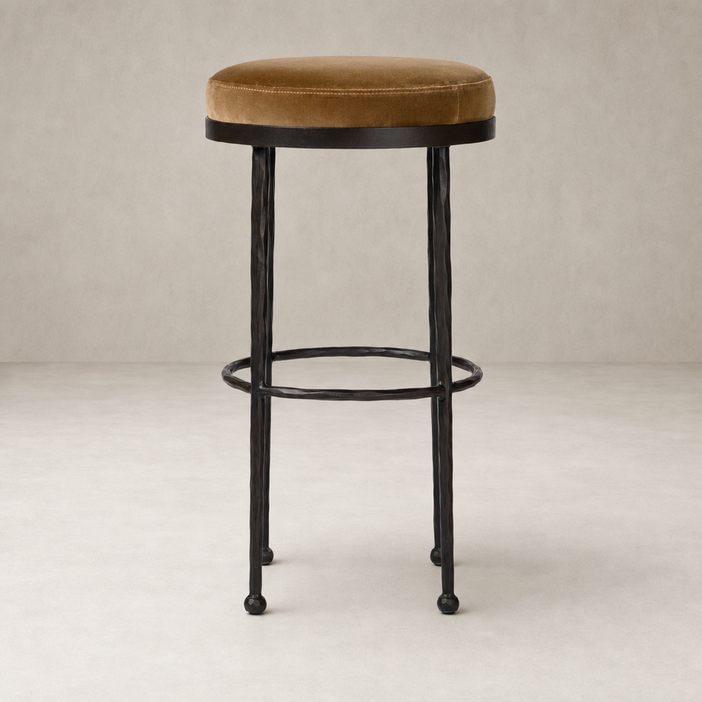 Jasper Bar + Counter Stool featuring Surrey Ochre velvet seat and black metal legs.