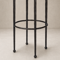 Jasper Bar + Counter Stool in Surrey Ochre with elegant, textured black metal base.