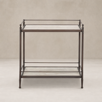 Soren Nightstand features a sleek design with a marble top and metal frame.