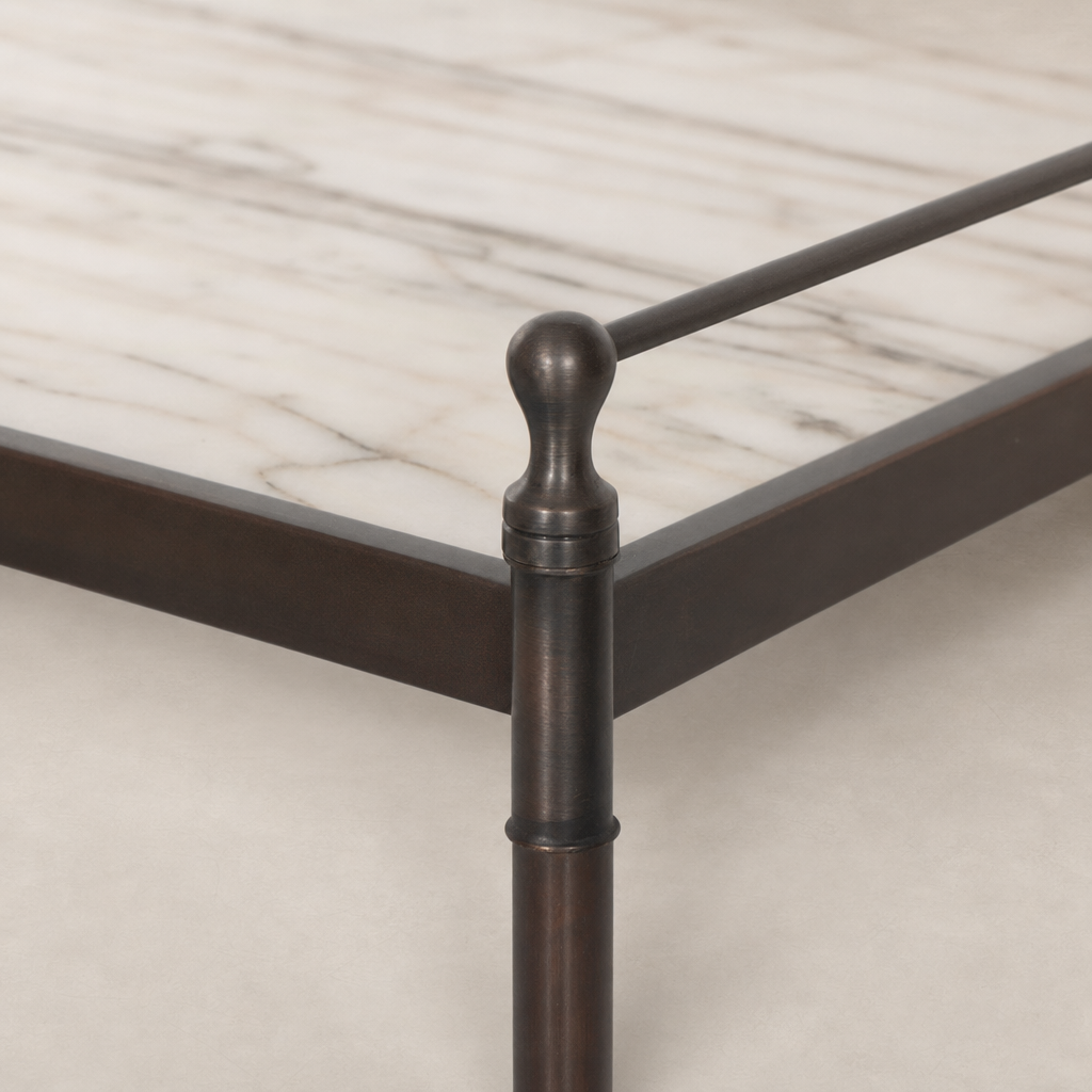 Soren Nightstand featuring a sleek metal frame and elegant marble top detail.