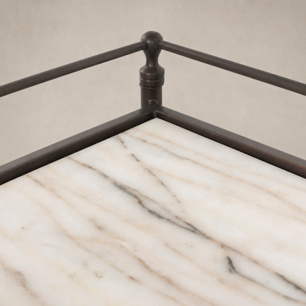 Soren Nightstand featuring a sleek marble top and elegant metal frame.