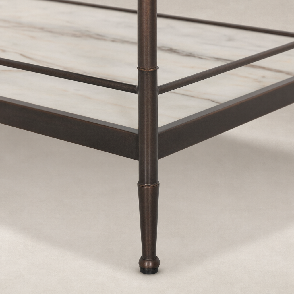 Soren Nightstand featuring sleek metal legs and a marble top design.
