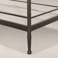 Soren Nightstand featuring sleek metal legs and a marble top design.