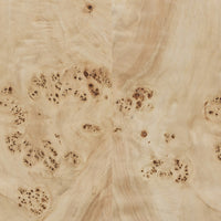 Selena Coffee Table features a light burl finish with unique grain patterns.