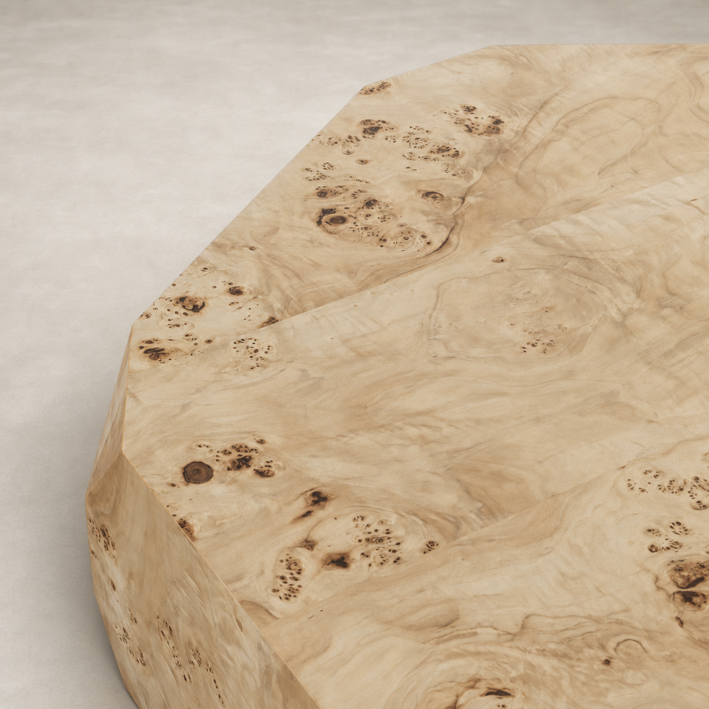 Close-up of Selena Coffee Table in light burl showcasing unique wood grain textures.
