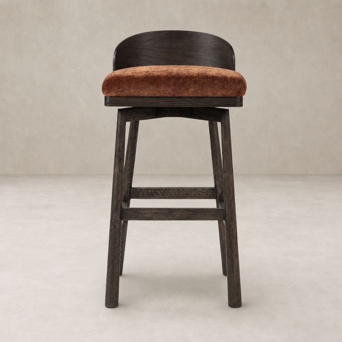 Quito Swivel Bar + Counter Stool in Altair Sienna with a plush seat and sleek wood legs.