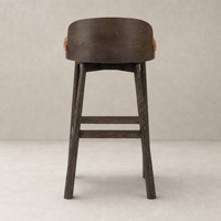 Quito Swivel Bar + Counter Stool in Altair Sienna with a curved wooden back.