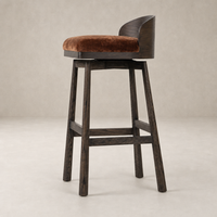 Quito Swivel Bar + Counter Stool in Altair Sienna features a soft seat and sleek wooden frame.