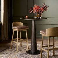 Quito Swivel Bar + Counter Stool in Palermo Cigar with sleek wood frame and plush seat.