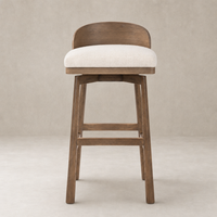 Quito Swivel Bar + Counter Stool in Thames Cream with a curved back and sturdy wood legs.