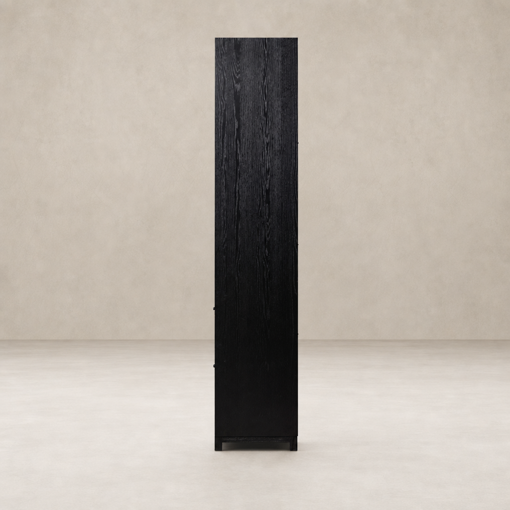 Tall Osaka Bookcase in drifted matte black, featuring sleek lines and a minimalist design.