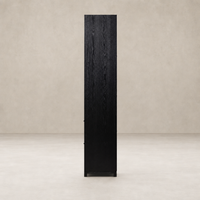 Tall Osaka Bookcase in drifted matte black, featuring sleek lines and a minimalist design.