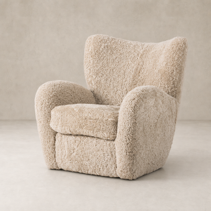 Beige shearling Elodie Chair featuring a plush, rounded design and soft texture.