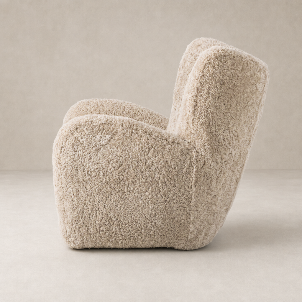 Elodie Chair in beige shearling featuring a soft, rounded silhouette and plush texture.