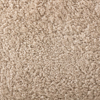 Beige shearling texture of the Elodie Chair, showcasing its soft, cozy surface.