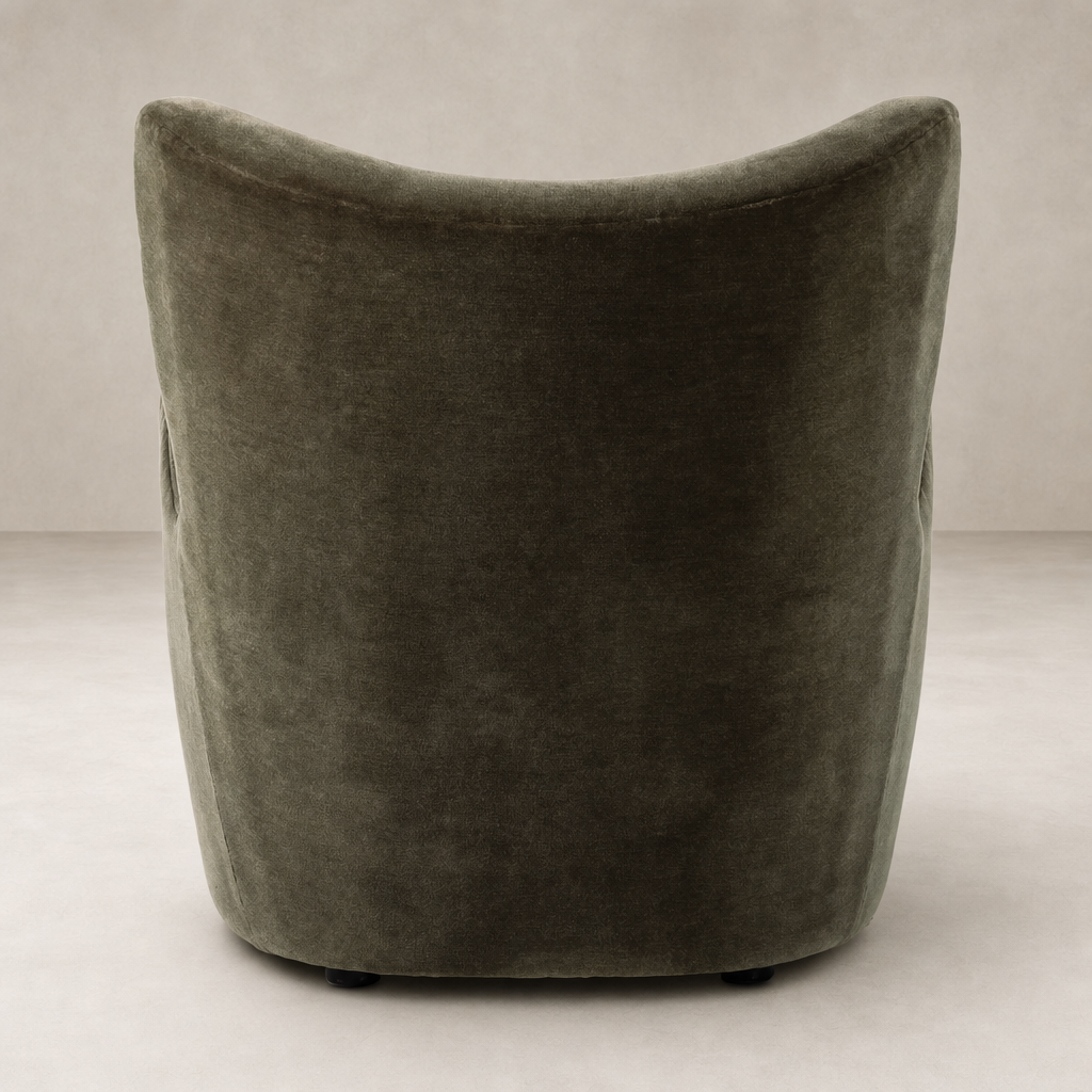 Elodie Chair in Monte Olive, featuring a sleek, curved back and soft velvet texture.
