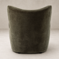 Elodie Chair in Monte Olive, featuring a sleek, curved back and soft velvet texture.