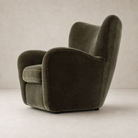 Elodie Chair in Monte Olive with soft curves and plush upholstery for comfort.