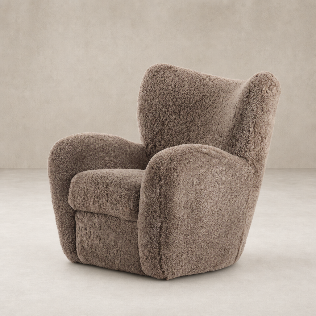 Elodie Chair in taupe shearling with a plush, rounded design and cozy texture.