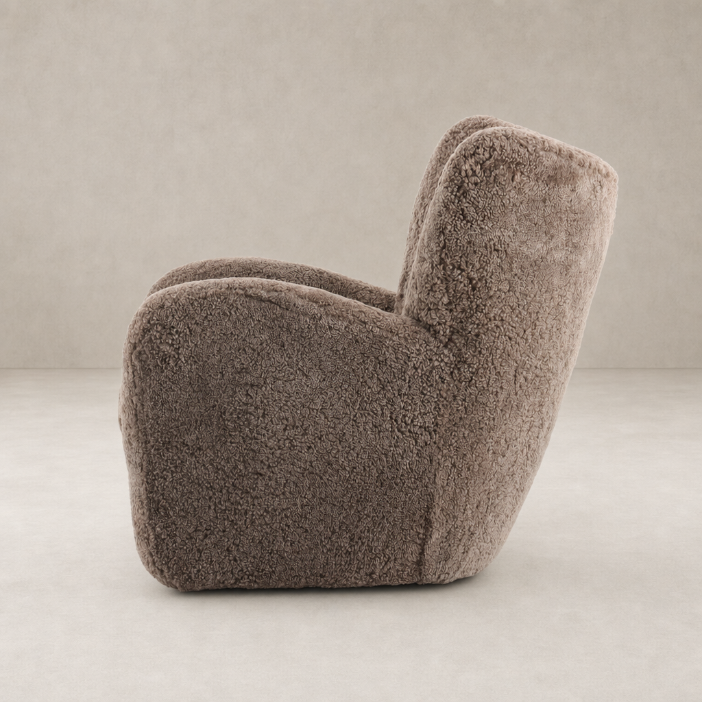 Elodie Chair in taupe shearling with a rounded, plush design and cozy texture.