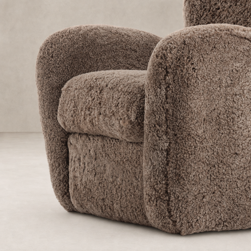 Taupe shearling Elodie Chair with rounded arms and soft, textured upholstery.