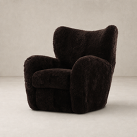 Cocoa shearling Elodie Chair featuring a cozy, rounded design for ultimate comfort.