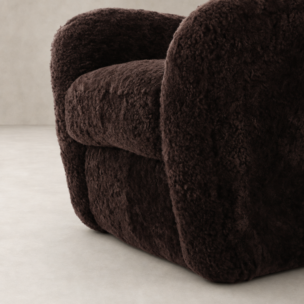 Elodie Chair in cocoa shearling showcasing a plush, rounded design and cozy texture.