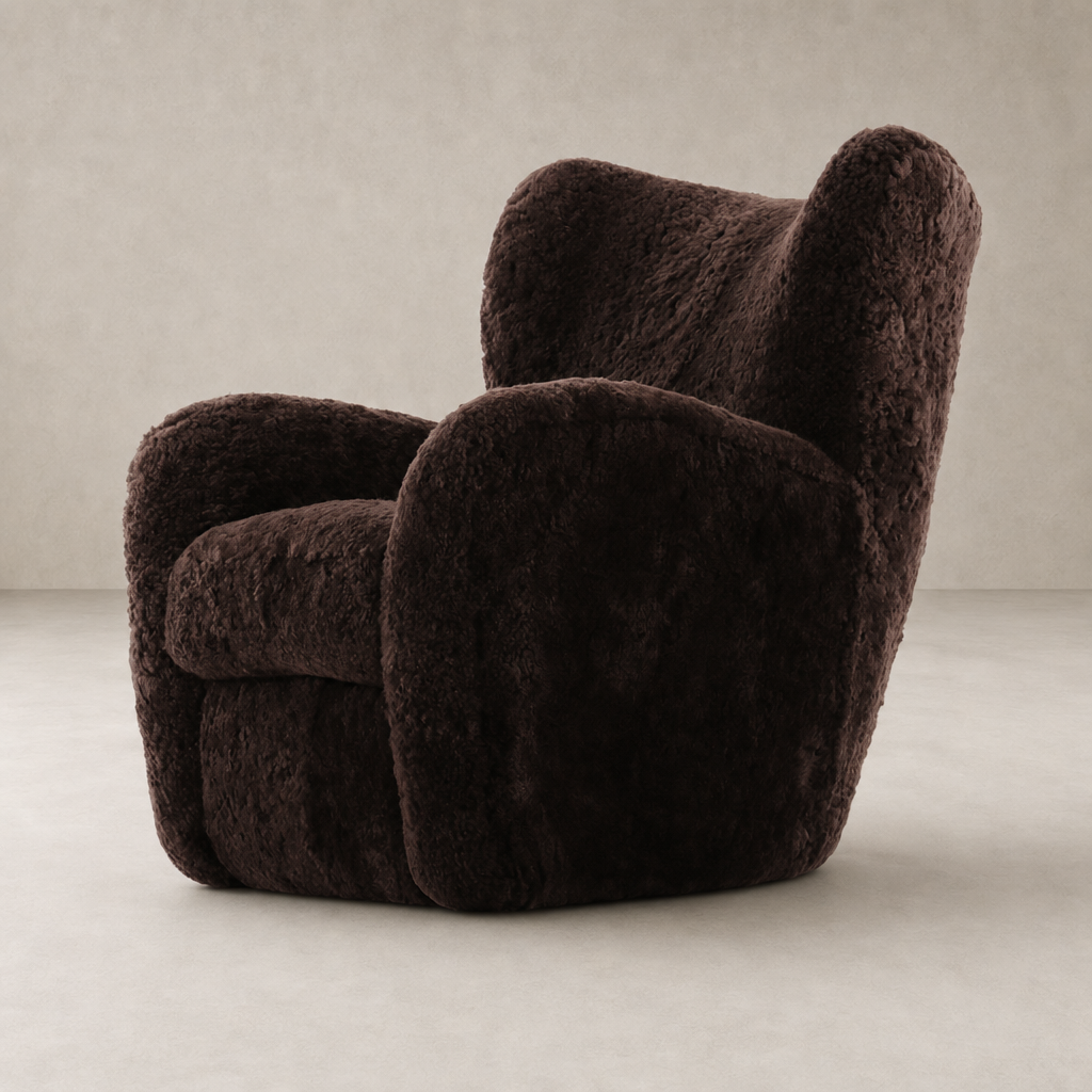 Elodie Chair in cocoa shearling with rounded armrests and plush cushioning.