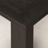 Otis End Table featuring a sleek dark finish and clean geometric lines.