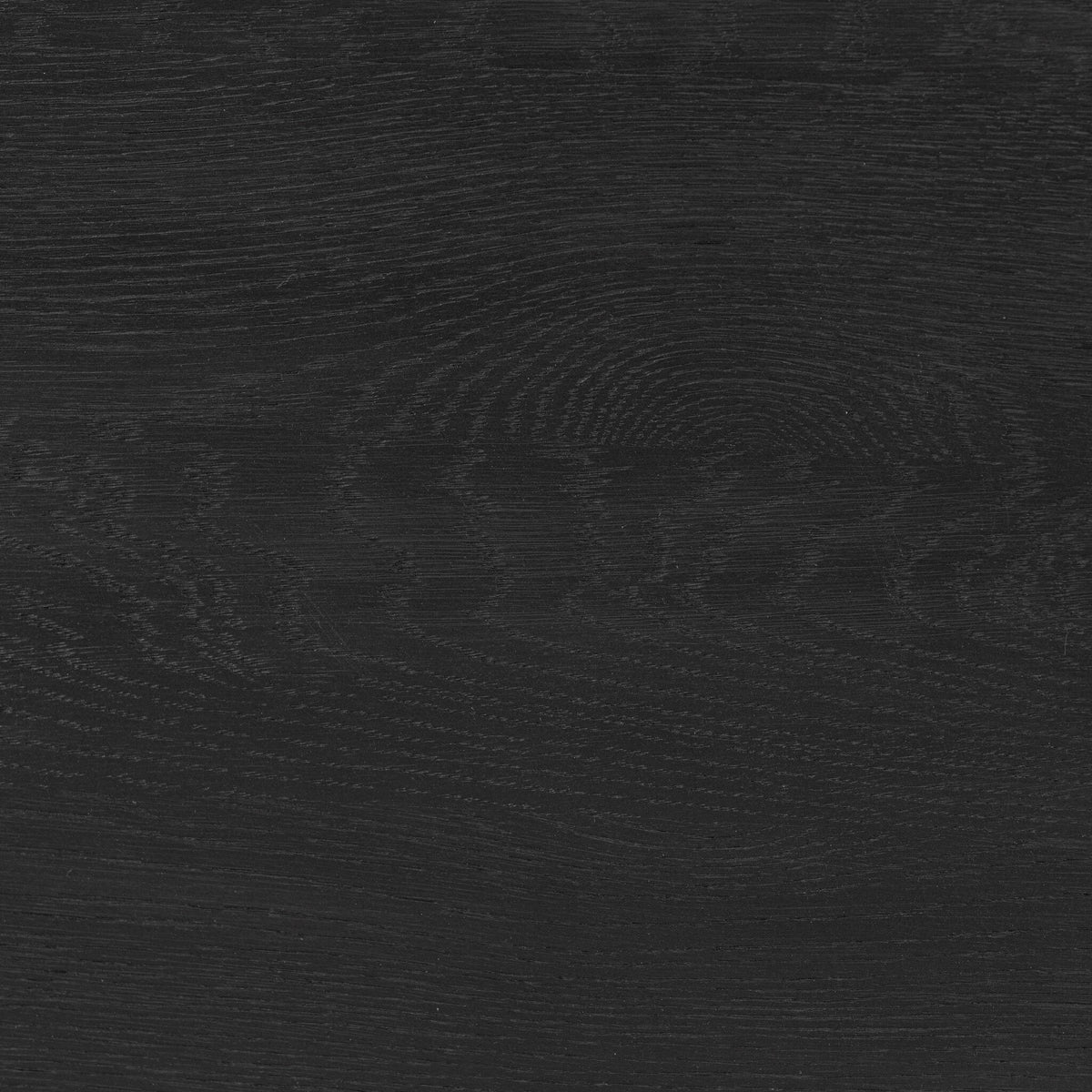 Ronan Coffee Table in worn black finish with a smooth, textured surface.