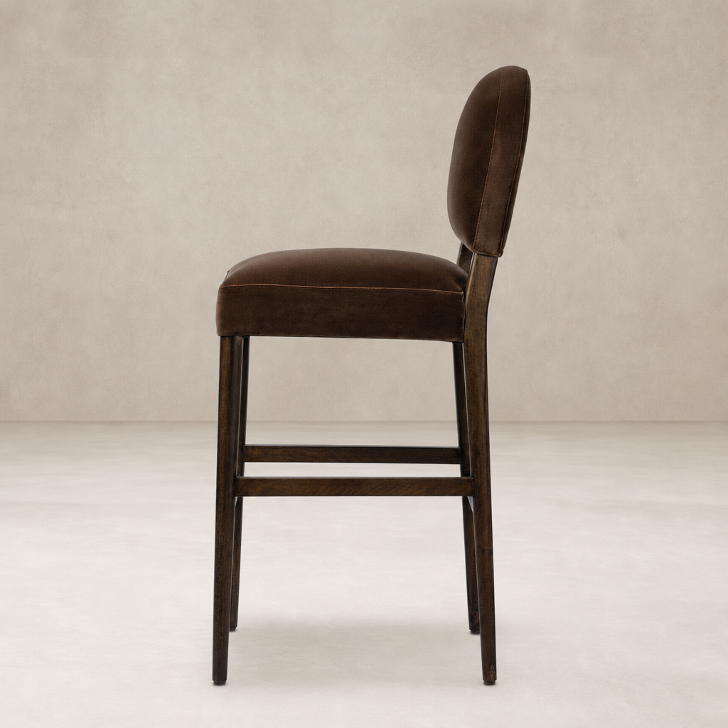 Corinne Bar + Counter Stool in Sapphire Coco with plush seating and tapered legs.