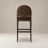 Back view of the Corinne Bar + Counter Stool in Sapphire Coco, showcasing its rounded design.