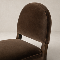 Corinne Bar + Counter Stool in Sapphire Coco featuring a plush, rounded backrest.