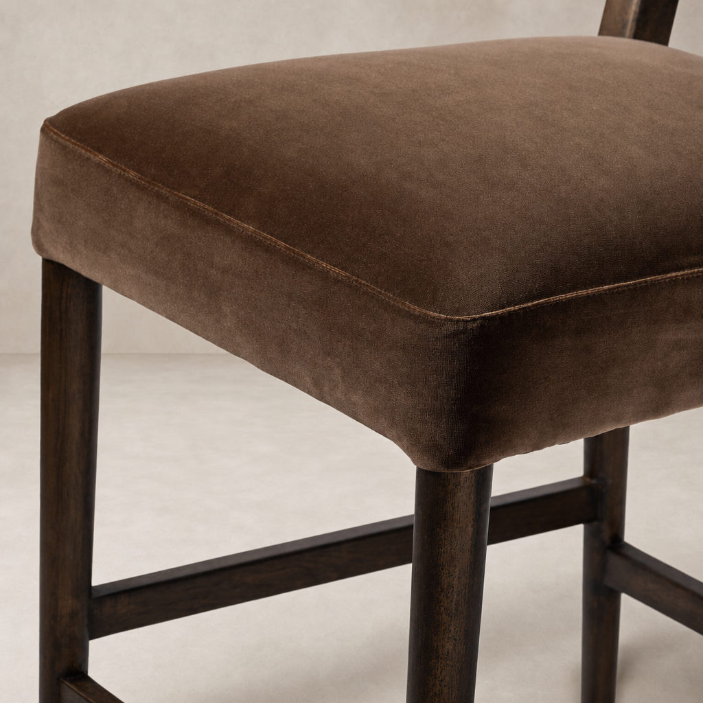 Close-up of the Corinne Bar + Counter Stool in Sapphire Coco velvet, showcasing its plush seat.