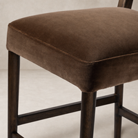 Close-up of the Corinne Bar + Counter Stool in Sapphire Coco velvet, showcasing its plush seat.