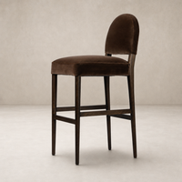 Corinne Bar + Counter Stool in Sapphire Coco with a sleek, curved backrest and plush upholstery.
