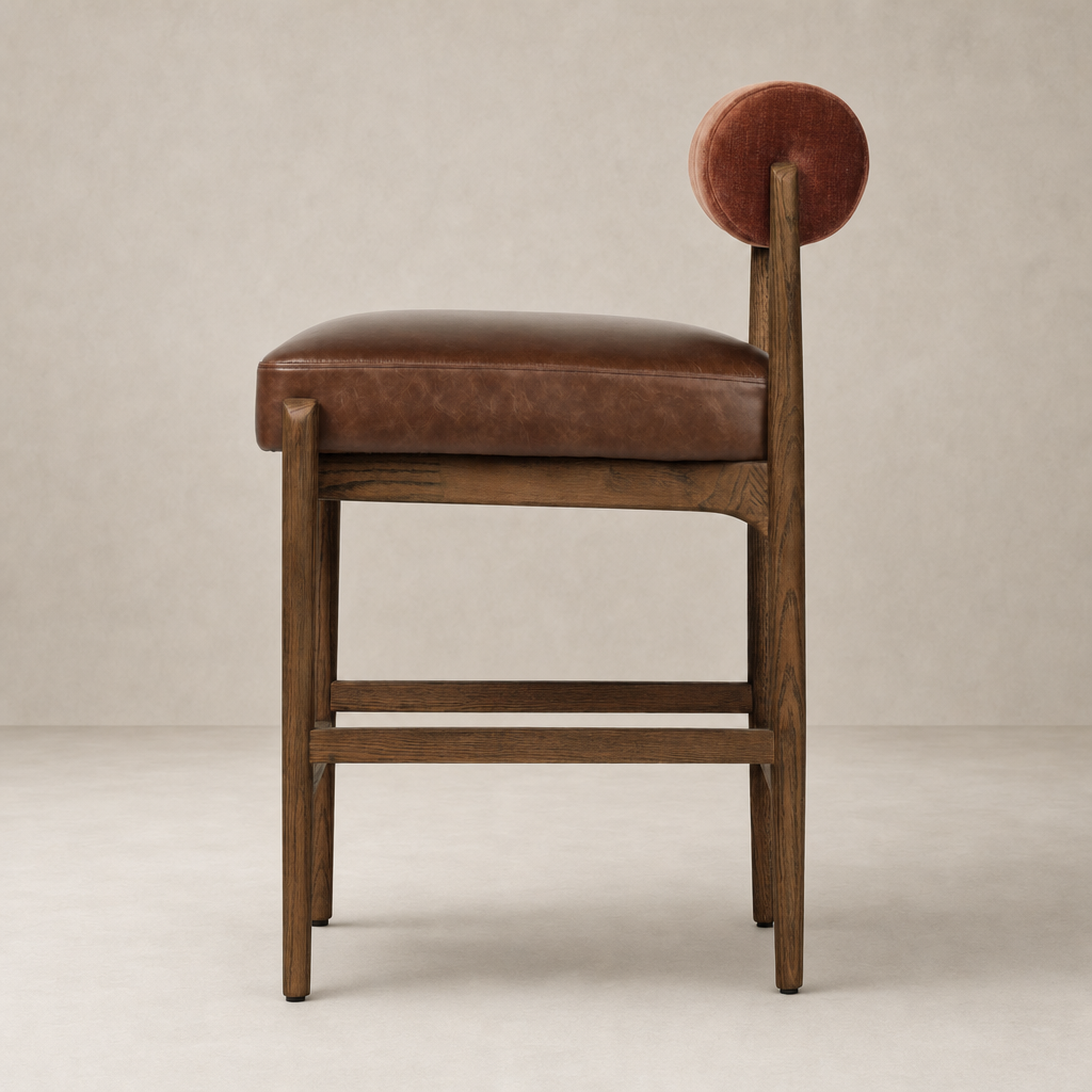 Side view of the Fern Bar + Counter Stool in Altair Sienna, featuring a round backrest.