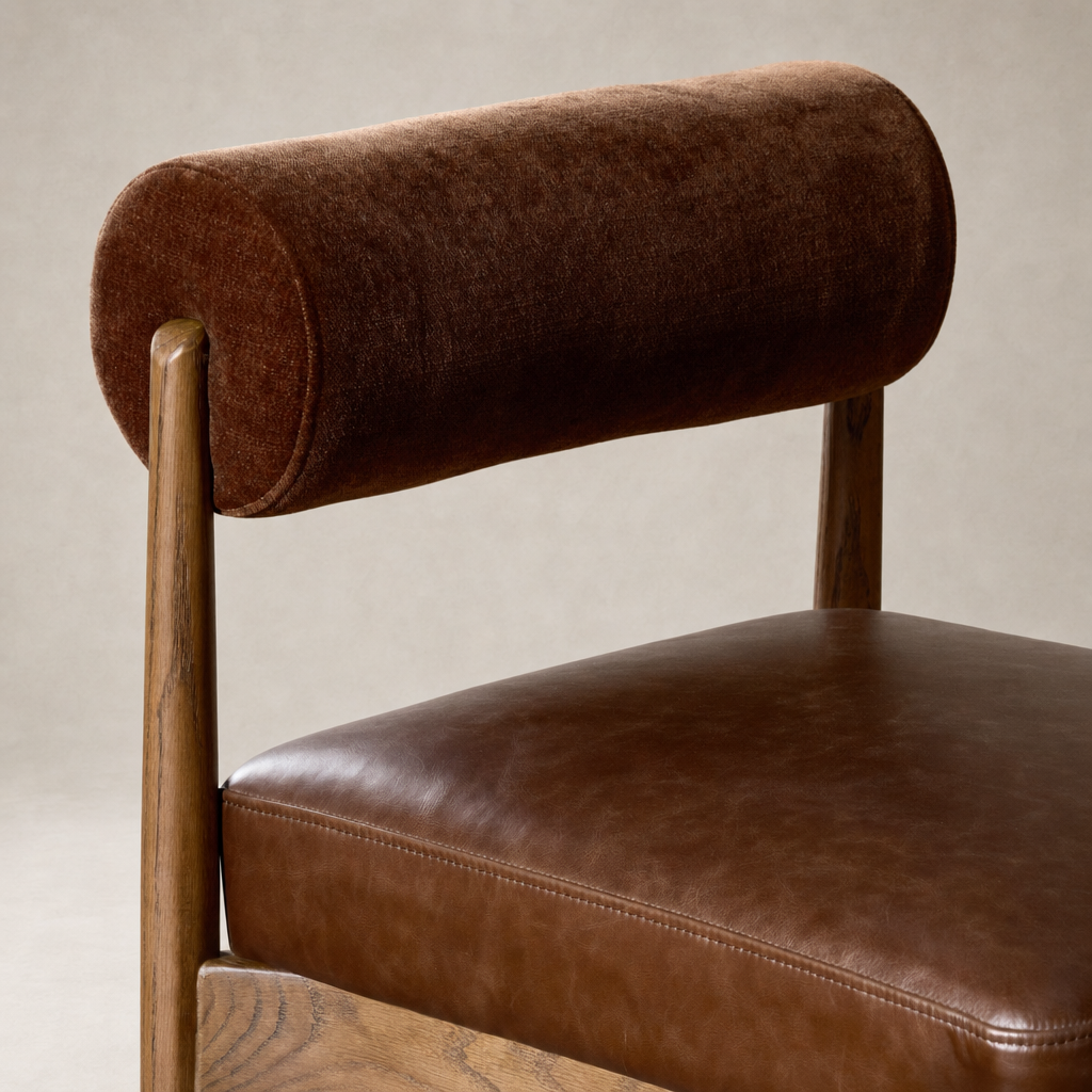 Fern Bar + Counter Stool in Altair Sienna featuring plush upholstery and a curved backrest.