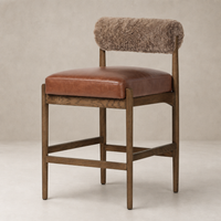 Fern Bar + Counter Stool featuring taupe shearling backrest and rich brown leather seat.