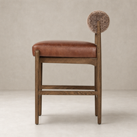 Fern Bar + Counter Stool in taupe shearling with a unique rounded backrest design.