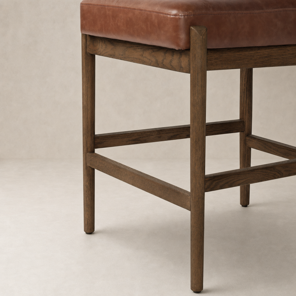 Fern Bar + Counter Stool in taupe shearling with a stylish wooden frame.