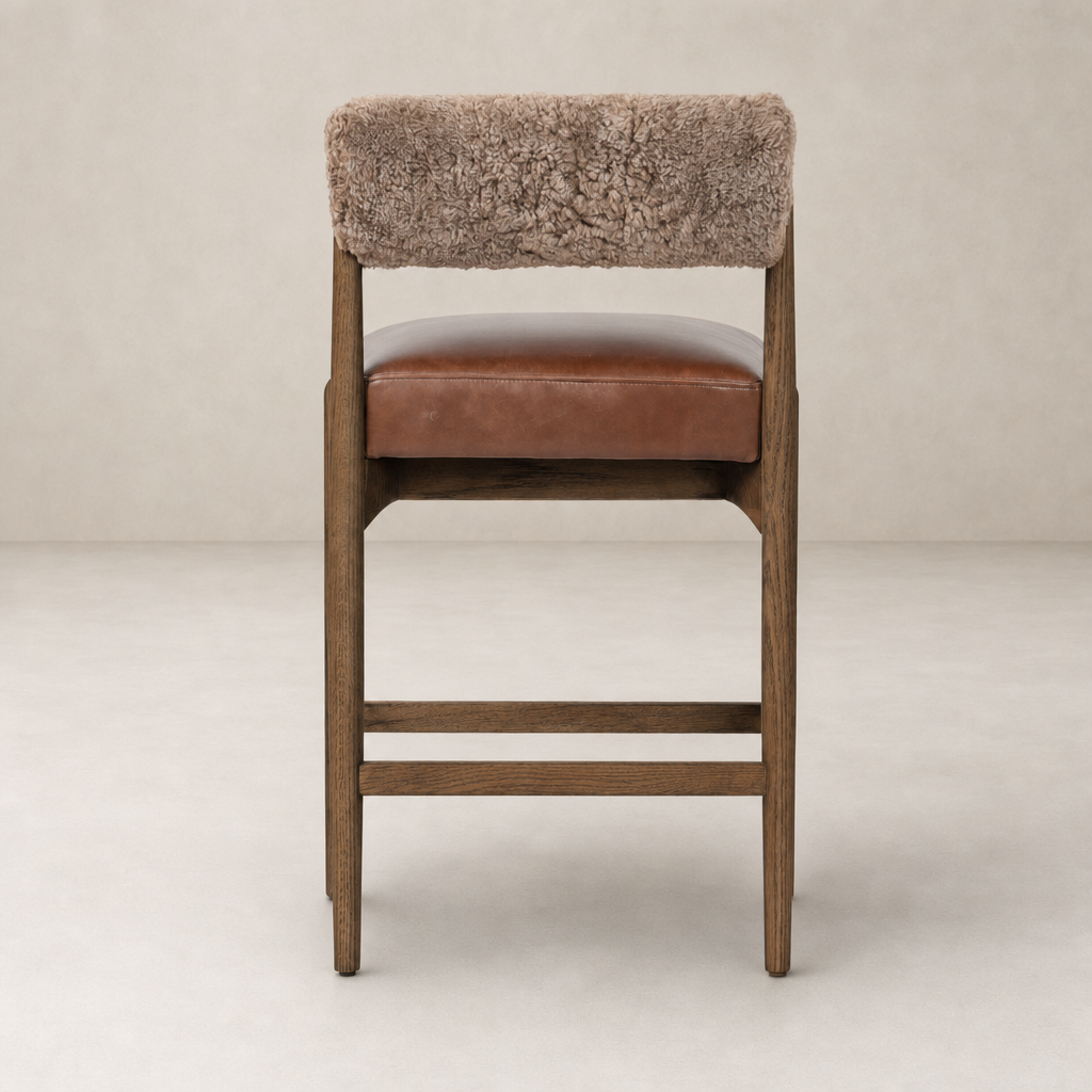 Fern Bar + Counter Stool with taupe shearling back and brown leather seat, showcasing modern design.